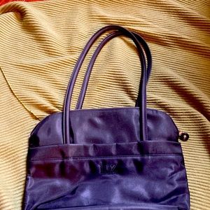 Liz Claiborne black zipper close pocket book.  Used, normal wear and tare.